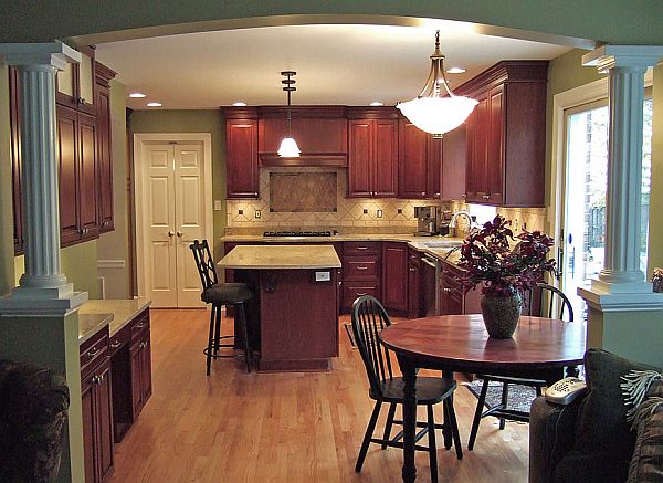 modern-kitchen-remodel-with-brown-wooden-kitchen-collection-and-small-banquette